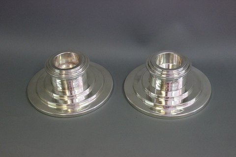 Silver candlesticks which we have polished up in our workshop.