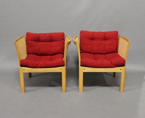 A pair of easy chairs designed by Rud Thygesen and Johnny Sørensen. 
5000m2 showroom.
