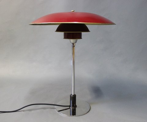 This PH table lamp has been fully restored after substantial fire damage.
