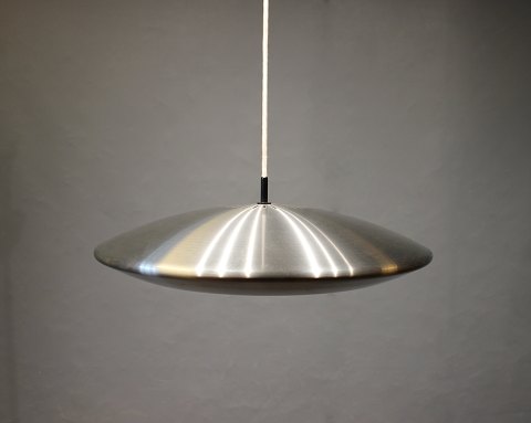 Diskos pendant in steel by Jo Hammerborg for Fog and Mørup from the 1960s.
5000m2 showroom.