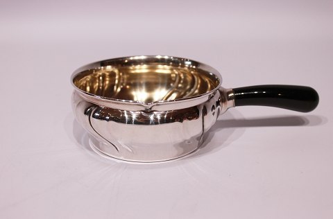 Small sauce boat with ebony handle and in hallmarked silver. 
5000m2 showroom.