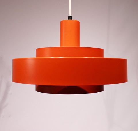 Equator pendant with orange/red lacquered metal shades by Jo Hammerborg for Fog 
and Mørup from the 1960s.
5000m2 showroom.