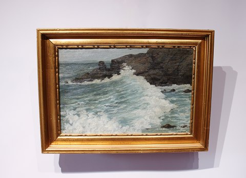 Oil painting with motif of crashing waves on a danish beach and with a gilded 
frame. 
5000m2 showroom.