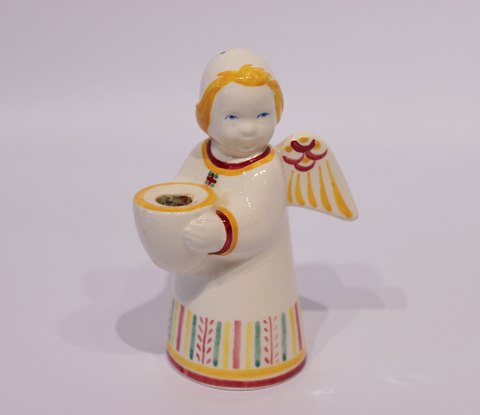 Angel with candleholder by Aluminia.
5000m2 showroom.