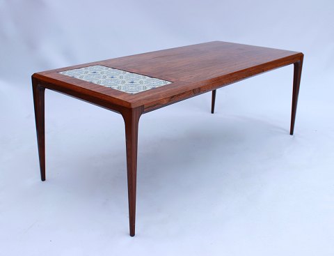 Coffee table in 
rosewood with Royal Copenhagen tiles designed by Johannes Andersen and 
manufactured by Silkeborg Furniture factory in the 1960s.
5000m2 showroom.