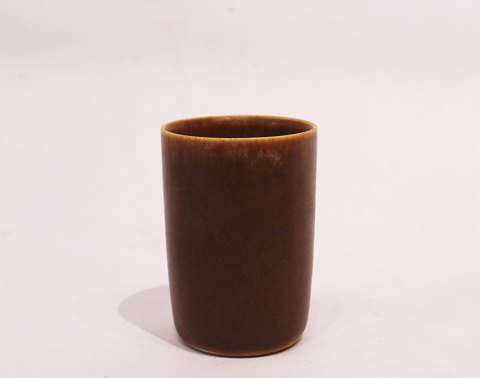 Brown ceramic vase by Palshus stamped KAS and the christmas of 1969.
5000m2 showroom.
