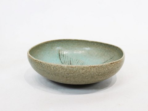 Ceramic bowl in 
turquoise colors, number 262, by Eva Stæhr Nielsen for Saxbo.
5000m2 showroom.