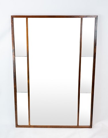 Mirror in rosewood of danish design from the 1960s.
5000m2 showroom.