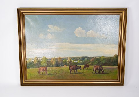 Oil painting with country side motif and gilded frame, by Niels Christiansen. 
5000m2 showroom.