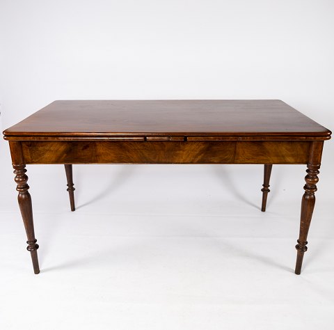 Sen Empire skrivebord/spisebord i mahogni med hollandsk udtræk, i flot antik 
stand fra 1840erne.
5000m2 udstilling.
