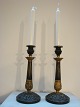A pair of old french bronze candlesticks from around 1820.
5000 m2 showroom.