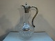 Wine decanter with silver plating. 
Height 28 cm. Several different models in stock at the moment. 
5000m2 showroom.