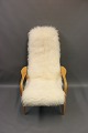 Armchair designed by Swedish Yngve Ekstrom. Padded with real long-haired 
sheepskin. 5000m2 showroom