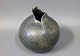 Grå keramik vase af ukendt kunster. 
5000m2 udstilling.