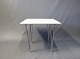 Bruno Mathsson table in White laminate and steel legs.
5000m2 showroom.