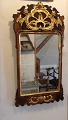 Mirror in Rococo style and walnut. The mirror is from around the 1740s, Denmark 
and is in it