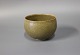 Lille keramik skål i grønne og brune farver, stemplet Ann K. 
5000m2 udstilling.