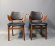 A pair of armchairs by Arne Hovmand Olsen in teak and upholstered in black 
classic leather of Danish Design from the 1960s.
5000m2 showroom.
