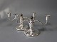 A pair of two-armed  candlesticks in hallmarked silver an decorated with Ebony, 
stamped SJ.
5000m2 showroom.