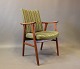 Armchair in teak and upholstered in green fabric of danish design from the 
1960s.
5000m2 showroom.