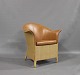 Lænestol i flet og polstret med brunt elegance læder af Sika Design.
5000m2 udstilling.