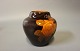 Small ceramic vase with brown glaze and decorated with floral motif by an 
unknown artist.
5000m2 showroom.