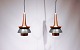 A pair of ceiling pendants in dark grey metal and copper by Jo Hammerborg from 
the 1960s.
5000m2 showroom.