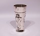 Vase decorated with roses, stamped CIM and of 830 silver.
5000m2 showroom.
