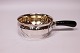 Small sauce boat with ebony handle and in hallmarked silver. 
5000m2 showroom.