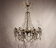 Large gustavian chandelier of prisms and lyre gilded bronze from around the 
1840-60s.
5000m2 showroom.
