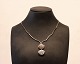 Necklace with large pendant of sterling silver, stamped AKZ.
5000m2 showroom.