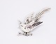 Brooch in the shape of a bird in 925 sterling silver and stamped Monet.
5000m2 showroom.