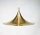 Gold colored Gubi Semi pendant by Claus Bonderup and Thorsten Thorup, 1968.
5000m2 showroom.