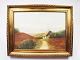 Oil painting in warm colors with motif of fields and thatched house with gilded 
frame.
5000m2 showroom.