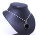 Necklace with 
Onyx pendant of 925 sterling silver stamped Dsi.
5000m2 showroom.