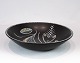 Large black ceramic bowl by Søholm.
5000m2 showroom.
