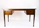 Skrivebord i palisander af dansk design fra 1960erne.
5000m2 udstilling.