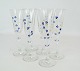 Set fo six champagne glass decorated with blue and gold flowers.
5000m2 showroom.
