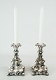 A pair of new Rococo silvered  candlesticks from the 1930s.
5000m2 showroom.