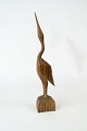 Figur i form af en fugl og af palisander.
5000m2 udstilling.