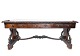 Antikt skrivebord af palisander med udskæringer og i flot antik stand fra 
1840erne.
5000m2 udstilling.
