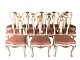 Set of 12 Rococo dining room chairs of white painted wood decorated with leaf 
gold and upholstered with light pink velvet, from the 1890s.
5000m2 showroom.