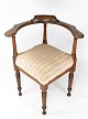 Antique armchair of oak and upholstered with light fabric from the 1930s.
5000m2 showroom.