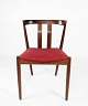 Dining room chair in teak and upholstered with red fabric of danish design from 
the 1960s. 
5000m2 showroom.