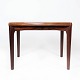 Side table in rosewood designed by Henning Kjærnulf and manufactured by Vejle 
Furniture in the 1960s.
5000m2 showroom.