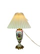 Table lamp of porcelain with motif and bronze from around the 1920s. 
5000m2 showroom.
Great condition
