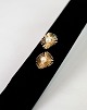 Vintage 14 carat ear clips stamped 585, bra designed by Bernhard Hertz - 
Copenhagen.
Dimensions in cm: D: 2
Great condition
