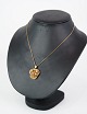 Pendant, designed by Flora Danica in gold-plated silver
Great condition
