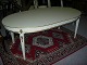 white dining room table with 4 plates  together 4 m
8 chairs in good condition 
5000 m2 showroom