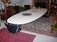 Piet hein bord Super elipse med hvid laminat.Længde 420 *140 med 10 stål ben i 
meget fin stand .5000 m2 udstilling